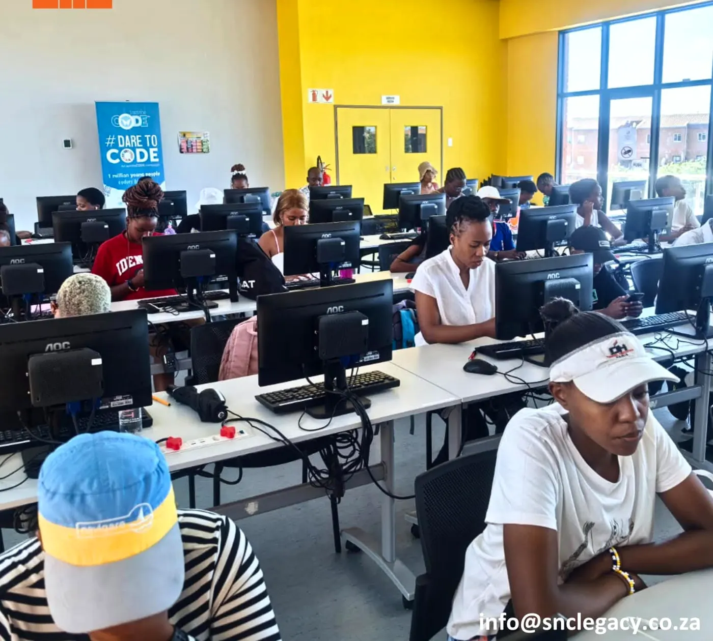 Learners at computers during an SNC training day