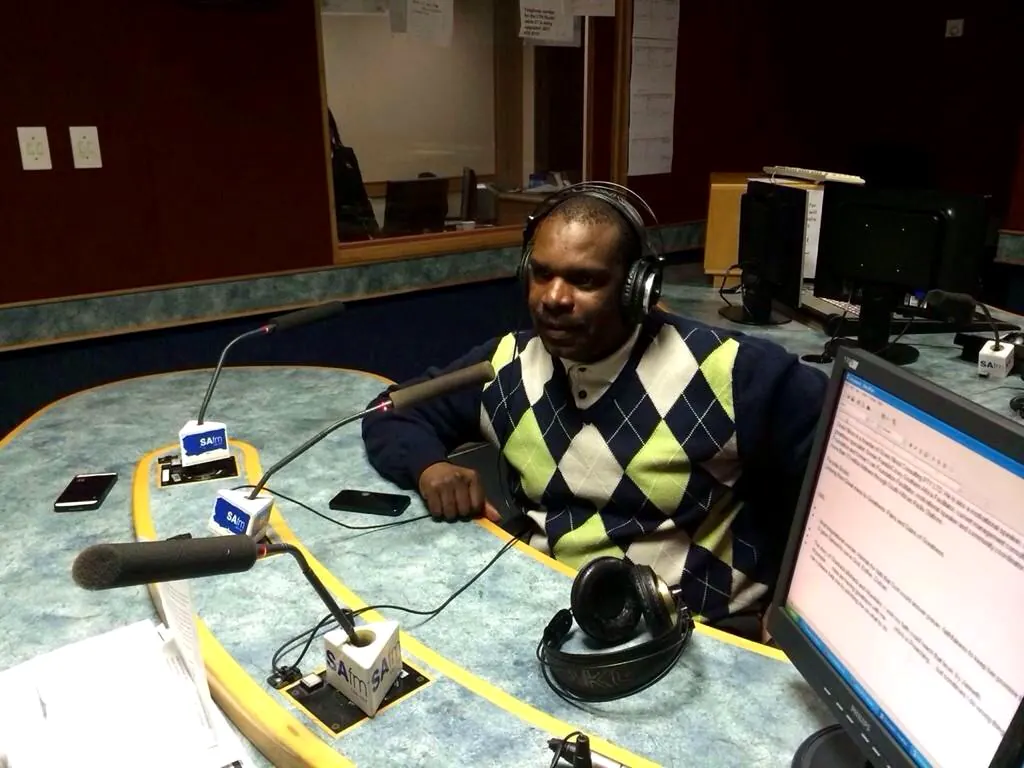 Sicelo Nkosi speaking live in a radio studio